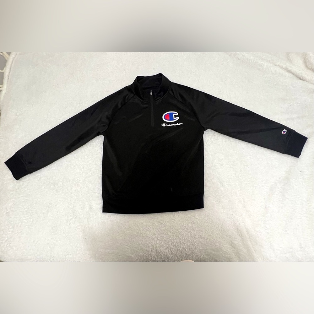 Champion black turtle neck sweater with a small zip up at the top.